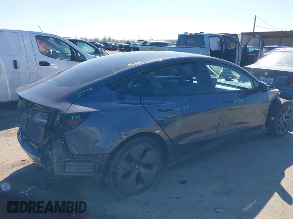 2022 Tesla Model 3 with VIN 5YJ3E1EAXNF326354, listed as a IAAI auction lot 41651872 with 27,922 mi miles and . Bid and sale history available at DreamBid. Image 4.