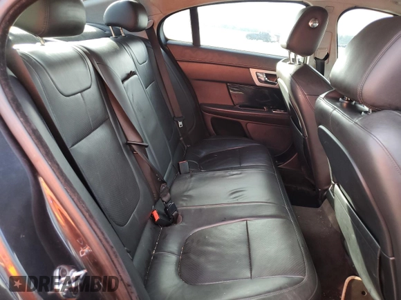 2014 Jaguar XF SC with VIN SAJWJ0EF0E8U31601, listed as a Copart auction lot 57146535 with 180,408 mi miles and Clean Title. Bid and sale history available at DreamBid. Image 10.