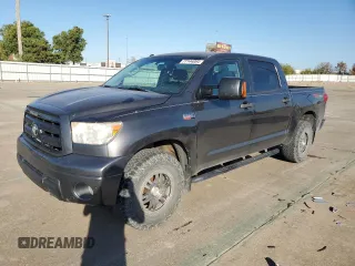 2012 Toyota Tundra 4WD Truck with VIN 5TFDW5F10CX233367, listed as a Copart auction lot 77144064 with 199,361 mi miles and Salvage Title. Bid and sale history available at carsss.com. Image 1.