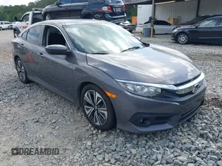 2018 Honda Civic EX-T z VIN JHMFC1F33JX017617, wystawiony jako IAAI lot #42274920 z przebiegiem 58 325 mil mil oraz . Historia ofert i sprzedaży dostępna na DreamBid. Obrazek 1.