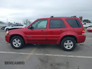 2006 Ford Escape Hybrid with VIN 1FMCU96H96KA52738, listed as a IAAI auction lot 41773608 with 214,834 mi miles and . Bid and sale history available at DreamBid. Image 14.