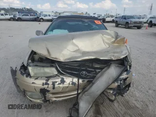 2001 Toyota Solara SE z VIN 2T1FF28P41C475759, wystawiony jako Copart lot #72155284 z przebiegiem Nie podano mil oraz Szkoda całkowita • Salvage title. Historia ofert i sprzedaży dostępna na DreamBid. Obrazek 5.