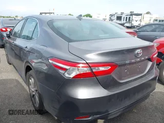 2019 Toyota Camry LE with VIN 4T1B11HK4KU254853, listed as a IAAI auction lot 42013255 with 153,664 mi miles and . Bid and sale history available at DreamBid. Image 3.