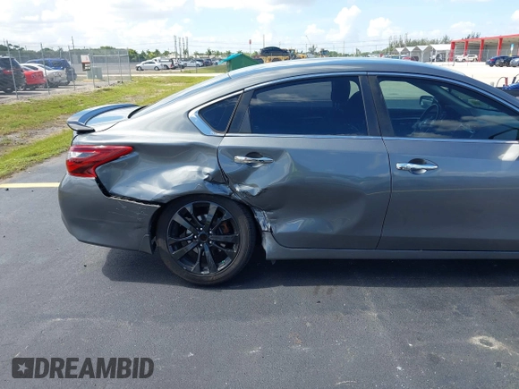 2017 Nissan Altima S with VIN 1N4AL3AP0HC297523, listed as a IAAI auction lot 42525818 with 162,767 mi miles and . Bid and sale history available at DreamBid. Image 6.