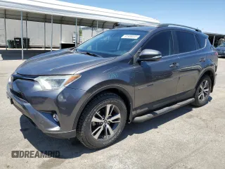 2016 Toyota RAV4 XLE with VIN JTMRFREV3GJ080056, listed as a Copart auction lot 61936035 with 98,898 mi miles and Salvage title. Bid and sale history available at DreamBid. Image 1.