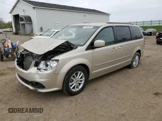 2016 Dodge Grand Caravan SXT with VIN 2C4RDGCGXGR312372, listed as a Copart auction lot 54943615 with 127,576 mi miles and Clean Title. Bid and sale history available at DreamBid. Image 1.