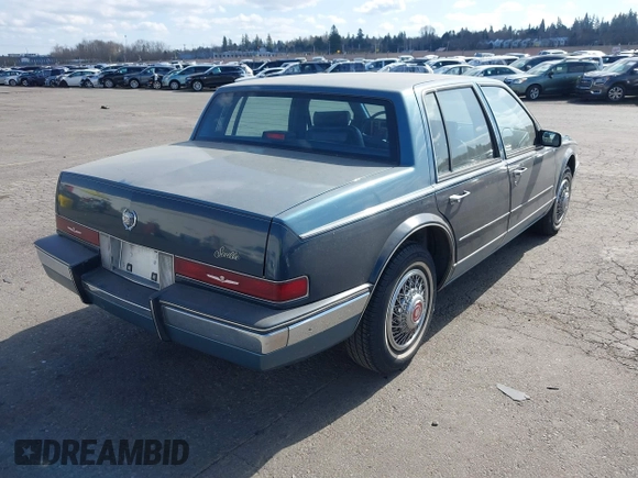 1986 Cadillac Seville z VIN 1G6KS6989GU813079, wystawiony jako IAAI lot #41732353 z przebiegiem Nie podano mil oraz . Historia ofert i sprzedaży dostępna na DreamBid. Obrazek 4.