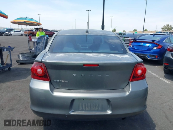 2012 Dodge Avenger SE with VIN 1C3CDZAB0CN247553, listed as a IAAI auction lot 42164424 with 103,463 mi miles and . Bid and sale history available at carsss.com. Image 14.