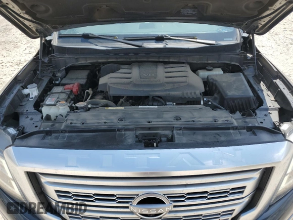 2023 Nissan Titan Platinum Reserve with VIN 1N6AA1EDXPN106467, listed as a Copart auction lot 53455215 with 56,061 mi miles and Salvage title. Bid and sale history available at DreamBid. Image 13.