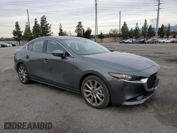 2022 Mazda 3 Premium with VIN 3MZBPADL9NM311250, listed as a Copart auction lot 86020464 with 10,237 mi miles and Salvage Title. Bid and sale history available at DreamBid. Image 4.