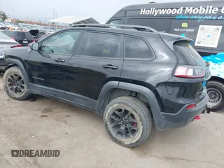 2019 Jeep Cherokee Trailhawk with VIN 1C4PJMBX6KD232515, listed as a IAAI auction lot 39495367 with 53,293 mi miles and . Bid and sale history available at DreamBid. Image 3.