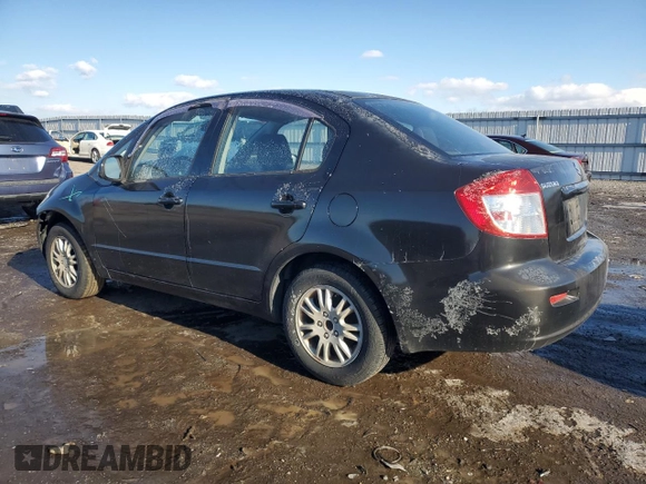 2012 Suzuki SX4 LE with VIN JS2YC5A3XC6303083, listed as a Copart auction lot 89265635 with 155,316 mi miles and Salvage Title. Bid and sale history available at carsss.com. Image 2.