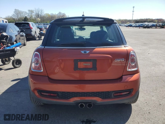 2011 MINI Hardtop S with VIN WMWSV3C57BTY11831, listed as a Copart auction lot 51985845 with 70,690 mi miles and Salvage Title. Bid and sale history available at DreamBid. Image 6.