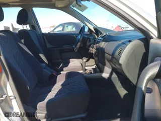 2002 Mazda Protege5 with VIN JM1BJ246X21467035, listed as a IAAI auction lot 41859444 with 150,585 mi miles. Bid and sale history available at carsss.com. Image 5.