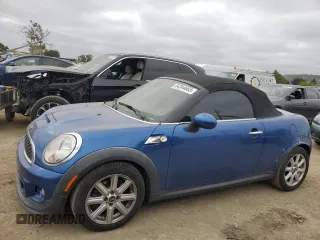 2013 MINI Roadster S z VIN WMWSY3C51DT593668, wystawiony jako Copart lot #54244665 z przebiegiem 205 177 mil mil oraz Szkody całkowita. Historia ofert i sprzedaży dostępna na DreamBid. Obrazek 1.