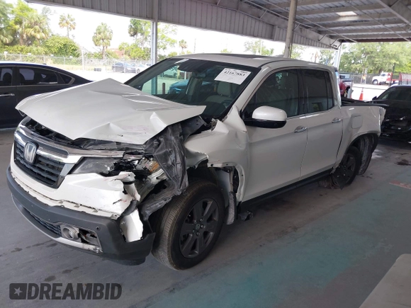 2020 Honda Ridgeline RTL-E with VIN 5FPYK3F71LB005028, listed as a IAAI auction lot 42167883 with 81,882 mi miles and . Bid and sale history available at DreamBid. Image 17.