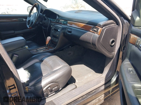 1998 Cadillac Seville STS z VIN 1G6KY5499WU916185, wystawiony jako IAAI lot #42035783 z przebiegiem 164 763 mil mil oraz . Historia ofert i sprzedaży dostępna na DreamBid. Obrazek 5.