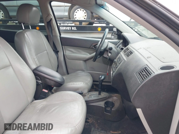 2007 Ford Focus S z VIN 1FAFP37N07W343784, wystawiony jako IAAI lot #42036642 z przebiegiem 223 104 mil mil oraz . Historia ofert i sprzedaży dostępna na DreamBid. Obrazek 5.