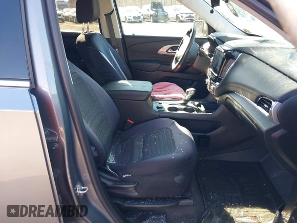 2021 Chevrolet Traverse LT Cloth with VIN 1GNEVGKW2MJ146411, listed as a IAAI auction lot 41694651 with 57,673 mi miles. Bid and sale history available at carsss.com. Image 5.