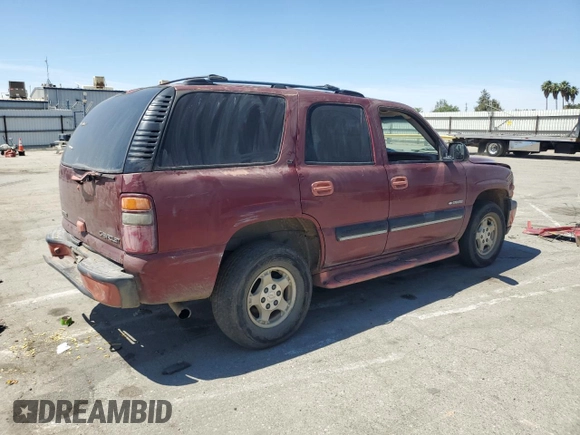 2001 Chevrolet Tahoe LT with VIN 1GNEC13T71R164164, listed as a Copart auction lot 60066165 with 234,506 mi miles and Salvage title. Bid and sale history available at DreamBid. Image 3.