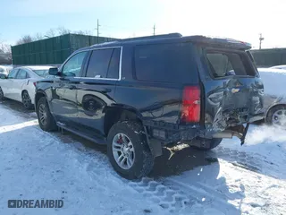 2019 Chevrolet Tahoe LT with VIN 1GNSKBKC7KR138999, listed as a IAAI auction lot 41339420 with 74,297 mi miles. Bid and sale history available at carsss.com. Image 3.
