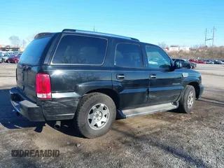 2005 Cadillac Escalade with VIN 1GYEC63T95R123072, listed as a IAAI auction lot 41861375 with 211,825 mi miles and . Bid and sale history available at DreamBid. Image 4.