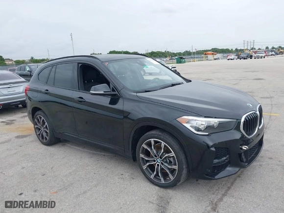 2021 BMW X1 sDrive28i with VIN WBXJG7C05M5U03116, listed as a IAAI auction lot 39837867 with 16,788 mi miles. Bid and sale history available at carsss.com. Image 1.