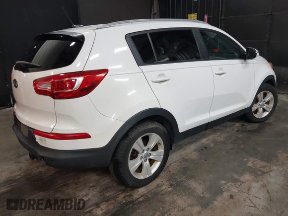 2012 Kia Sportage LX with VIN KNDPB3A26C7269092, listed as a IAAI auction lot 41892059 with 149,000 mi miles. Bid and sale history available at carsss.com. Image 4.