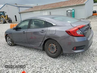 2017 Honda Civic LX with VIN 19XFC2F55HE070967, listed as a Copart auction lot 58773025 with 81,177 mi miles and Salvage title. Bid and sale history available at DreamBid. Image 2.