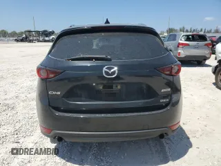 2018 Mazda CX-5 Touring with VIN JM3KFACM2J1327725, listed as a Copart auction lot 54894765 with 56,194 mi miles and Salvage Title. Bid and sale history available at carsss.com. Image 6.