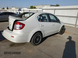 2009 Suzuki SX4 Man FWD with VIN JS2YC412796200908, listed as a Copart auction lot 73821924 with 125,721 mi miles and Salvage Title. Bid and sale history available at carsss.com. Image 3.