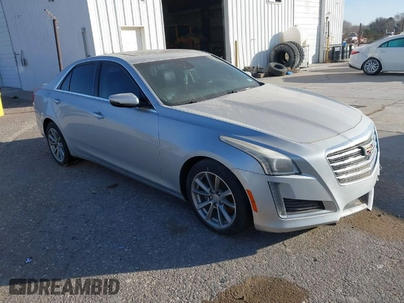 2019 Cadillac CTS Luxury RWD with VIN 1G6AR5SX7K0110826, listed as a IAAI auction lot 41596118 with 58,387 mi miles and . Bid and sale history available at DreamBid. Image 1.