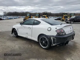 2003 Hyundai Tiburon z VIN KMHHM65D53U042971, wystawiony jako Copart lot #86919434 z przebiegiem 202 250 mil mil oraz Szkoda całkowita • Salvage title. Historia ofert i sprzedaży dostępna na DreamBid. Obrazek 2.