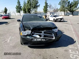 2013 Dodge Charger SE z VIN 2C3CDXBG6DH640417, wystawiony jako Copart lot #46549115 z przebiegiem 176 853 mil mil oraz Szkody całkowita. Historia ofert i sprzedaży dostępna na DreamBid. Obrazek 11.