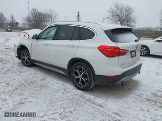 2018 BMW X1 xDrive28i with VIN WBXHT3C33J3H29973, listed as a IAAI auction lot 41547866 with 1 mi miles. Bid and sale history available at carsss.com. Image 3.
