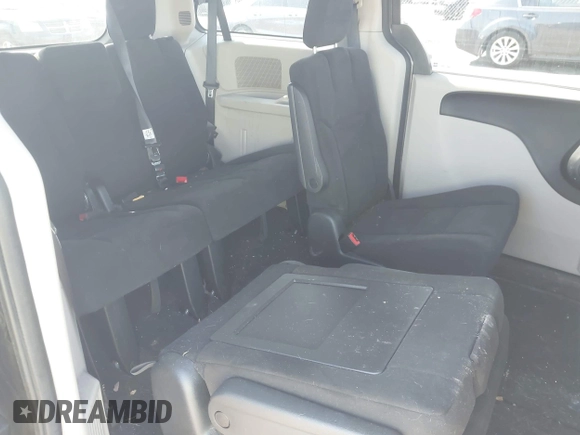 2015 Dodge Grand Caravan SE with VIN 2C4RDGBG2FR684367, listed as a IAAI auction lot 42167621 with 216,628 mi miles and . Bid and sale history available at DreamBid. Image 8.