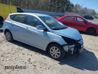 2014 Hyundai Accent GS with VIN KMHCT5AE1EU187112, listed as a IAAI auction lot 41894869 with 100,640 mi miles. Bid and sale history available at carsss.com. Image 1.