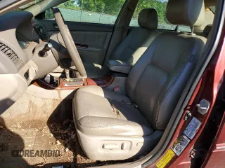 2004 Toyota Camry LE z VIN 4T1BE30K44U299631, wystawiony jako Copart lot #53949745 z przebiegiem 247 444 mil mil oraz Szkoda całkowita • Salvage title. Historia ofert i sprzedaży dostępna na DreamBid. Obrazek 7.