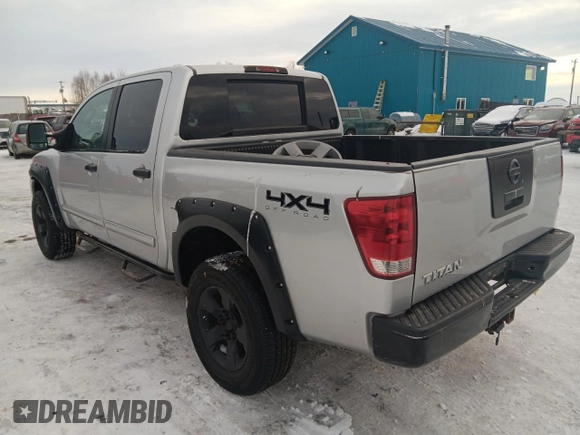 2005 Nissan Titan SE with VIN 1N6BA07B15N535701, listed as a Copart auction lot 46502565 with 180,923 mi miles and Salvage Title. Bid and sale history available at DreamBid. Image 2.