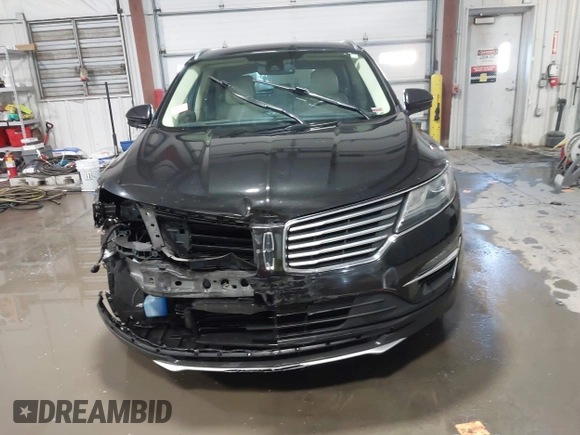 2015 Lincoln MKC with VIN 5LMCJ1A98FUJ10348, listed as a IAAI auction lot 41566416 with 133,035 mi miles and . Bid and sale history available at DreamBid. Image 12.