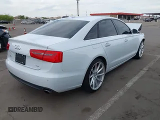2015 Audi A6 2.0T Premium Plus with VIN WAUGFAFC7FN010019, listed as a IAAI auction lot 42033638 with 1 mi miles. Bid and sale history available at carsss.com. Image 4.