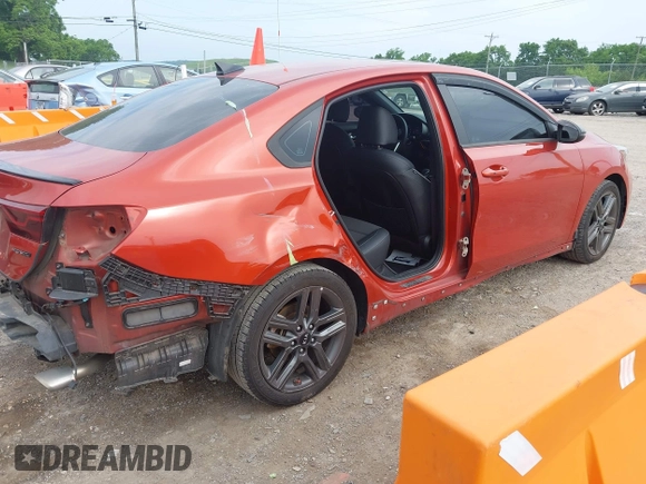 2021 Kia Forte GT-Line z VIN 3KPF34AD7ME410270, wystawiony jako IAAI lot #42259704 z przebiegiem 65 310 mil mil oraz . Historia ofert i sprzedaży dostępna na DreamBid. Obrazek 4.