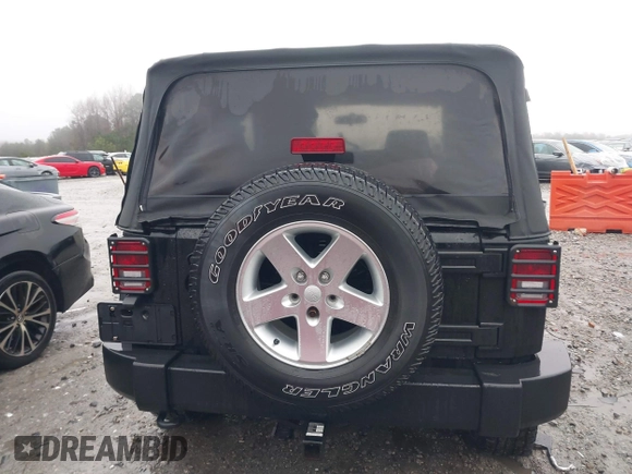 2012 Jeep Wrangler Sport z VIN 1C4AJWAG8CL262755, wystawiony jako IAAI lot #41566823 z przebiegiem 164 135 mil mil oraz . Historia ofert i sprzedaży dostępna na DreamBid. Obrazek 17.