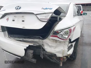 2012 Hyundai Sonata Hybrid with VIN KMHEC4A44CA038170, listed as a IAAI auction lot 41945015 with 90,404 mi miles and . Bid and sale history available at DreamBid. Image 6.