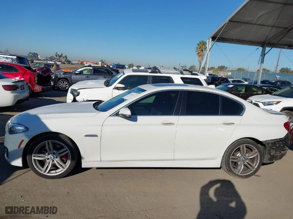 2015 BMW 5 Series 528i with VIN WBA5A5C56FD524971, listed as a IAAI auction lot 41652813 with 102,307 mi miles. Bid and sale history available at carsss.com. Image 15.