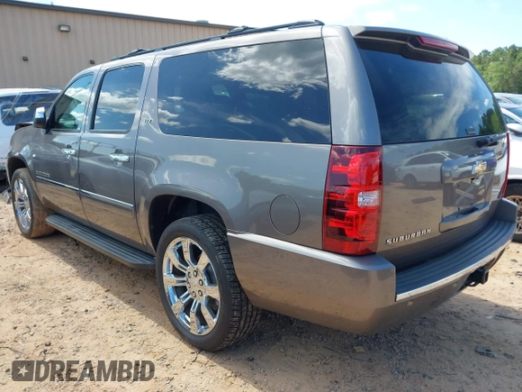 2011 Chevrolet Suburban LTZ with VIN 1GNSKKE3XBR394436, listed as a IAAI auction lot 42324225 with 132,871 mi miles and . Bid and sale history available at DreamBid. Image 3.