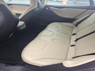 2013 Tesla Model S с VIN 5YJSA1DN6DFP26504, выставлен на аукционе IAAI как лот 41703859 с пробегом 135 552 миль миль и . История ставок и продаж доступна на DreamBid. Изображение 8.