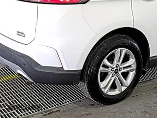 2019 Ford Edge SEL with VIN 2FMPK3J9XKBC37759, listed as a IAAI auction lot 42666643 with 103,812 mi miles and . Bid and sale history available at DreamBid. Image 9.