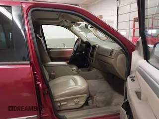 2003 Mercury Mountaineer Convenience z VIN 4M2ZU86K23UJ14446, wystawiony jako IAAI lot #41801753 z przebiegiem 150 629 mil mil oraz . Historia ofert i sprzedaży dostępna na DreamBid. Obrazek 5.