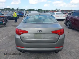 2013 Kia Optima LX z VIN 5XXGM4A74DG147688, wystawiony jako IAAI lot #42127503 z przebiegiem 148 705 mil mil oraz . Historia ofert i sprzedaży dostępna na DreamBid. Obrazek 16.
